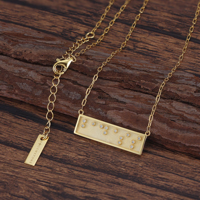 badass message bar necklace in gold by Touchstone